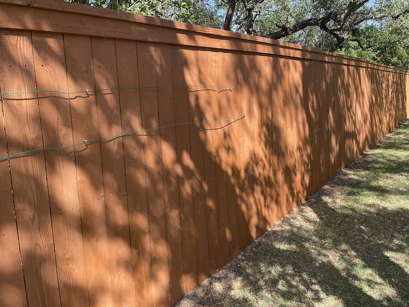fence staining timberwood park after